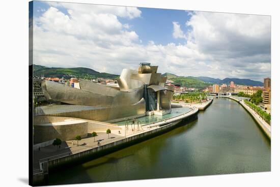 The Guggenheim Museum of Contemporary Art of Bilbao (Bilbo) on the river Ibaizabal, located on t...-null-Stretched Canvas