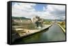 The Guggenheim Museum of Contemporary Art of Bilbao (Bilbo) on the river Ibaizabal, located on t...-null-Framed Stretched Canvas