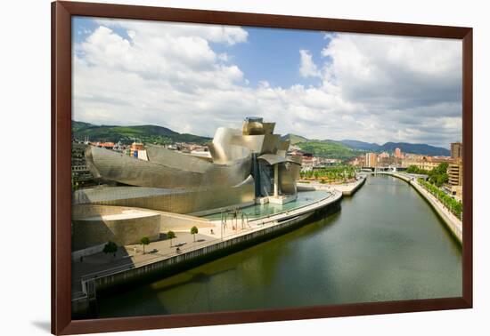 The Guggenheim Museum of Contemporary Art of Bilbao (Bilbo) on the river Ibaizabal, located on t...-null-Framed Photographic Print