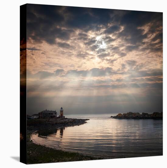 The Harbour and Lighthouse at Portpatrick, Dumfries and Galloway, Scotland, on a Stormy Day..-Travellinglight-Stretched Canvas