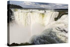 The headwater of Iguazu Falls with a rainbow from the Argentinian-James White-Stretched Canvas