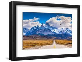 The Highway Crosses the Patagonia and Leads to Snow-Capped Peaks of Mount Fitzroy. over the Road Fl-kavram-Framed Photographic Print