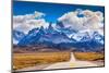 The Highway Crosses the Patagonia and Leads to Snow-Capped Peaks of Mount Fitzroy. over the Road Fl-kavram-Mounted Photographic Print