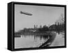 The Hindenburg Airship of Zeppelin Design Flying over City Where it was Fabricated-null-Framed Stretched Canvas