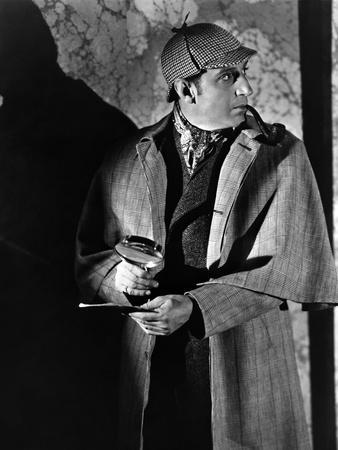 https://imgc.allpostersimages.com/img/posters/the-hound-of-the-baskervilles-1939-directed-by-sidney-lanfield-basil-rathbone-b-w-photo_u-L-Q1C1O2V0.jpg?artPerspective=n