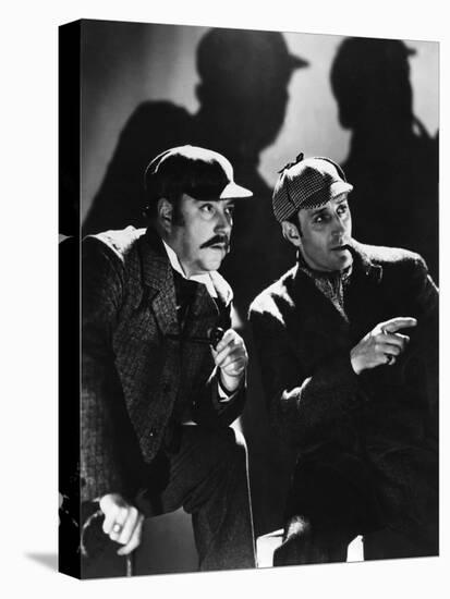 THE HOUND OF THE BASKERVILLES, 1939 directed by SIDNEY LANFIELD. Nigel Bruce and Basil Rathbone (b/-null-Stretched Canvas