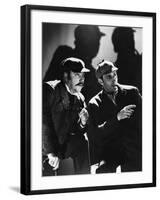 THE HOUND OF THE BASKERVILLES, 1939 directed by SIDNEY LANFIELD. Nigel Bruce and Basil Rathbone (b/-null-Framed Photo