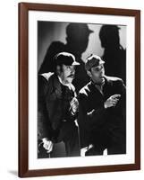 THE HOUND OF THE BASKERVILLES, 1939 directed by SIDNEY LANFIELD. Nigel Bruce and Basil Rathbone (b/-null-Framed Photo