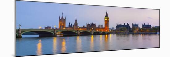 The Houses of Parliament and the River Thames Illuminated at Dusk.-Doug Pearson-Mounted Photographic Print