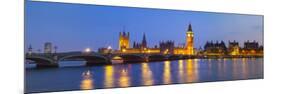 The Houses of Parliament and the River Thames Illuminated at Dusk.-Doug Pearson-Mounted Photographic Print