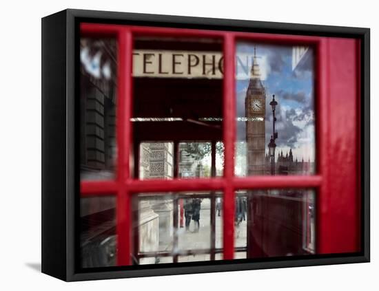 The houses of parliament reflected in an iconic red phone box in Westminster, London.-Alex Saberi-Framed Stretched Canvas
