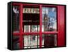 The houses of parliament reflected in an iconic red phone box in Westminster, London.-Alex Saberi-Framed Stretched Canvas