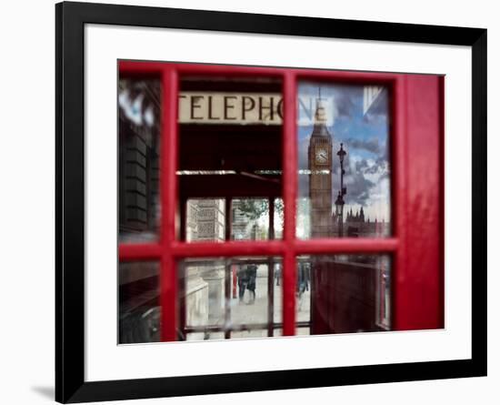 The houses of parliament reflected in an iconic red phone box in Westminster, London.-Alex Saberi-Framed Photographic Print