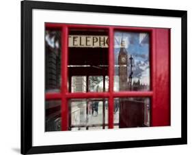 The houses of parliament reflected in an iconic red phone box in Westminster, London.-Alex Saberi-Framed Photographic Print