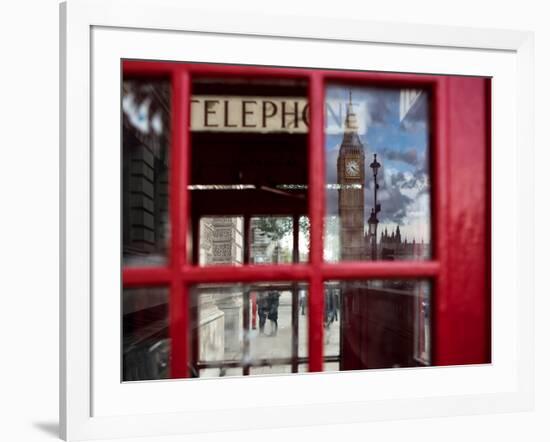 The houses of parliament reflected in an iconic red phone box in Westminster, London.-Alex Saberi-Framed Photographic Print