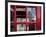 The houses of parliament reflected in an iconic red phone box in Westminster, London.-Alex Saberi-Framed Photographic Print