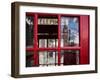 The houses of parliament reflected in an iconic red phone box in Westminster, London.-Alex Saberi-Framed Premium Photographic Print