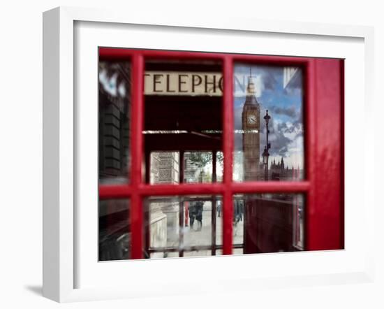 The houses of parliament reflected in an iconic red phone box in Westminster, London.-Alex Saberi-Framed Premium Photographic Print