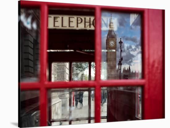 The houses of parliament reflected in an iconic red phone box in Westminster, London.-Alex Saberi-Stretched Canvas