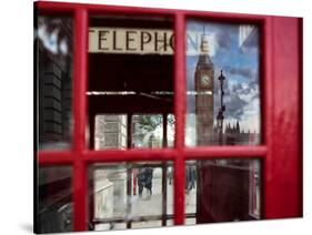 The houses of parliament reflected in an iconic red phone box in Westminster, London.-Alex Saberi-Stretched Canvas