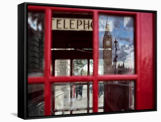 The houses of parliament reflected in an iconic red phone box in Westminster, London.-Alex Saberi-Framed Stretched Canvas