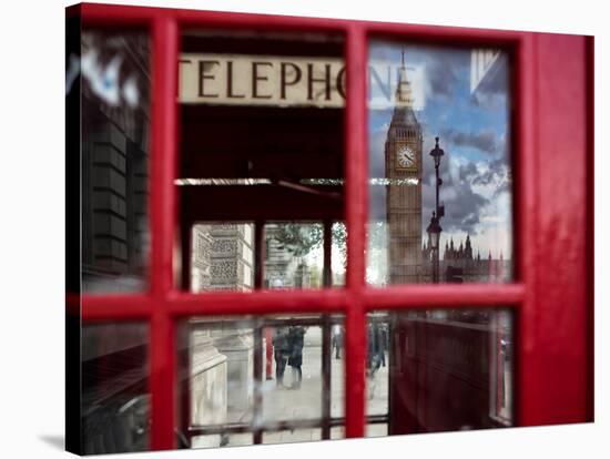 The houses of parliament reflected in an iconic red phone box in Westminster, London.-Alex Saberi-Stretched Canvas
