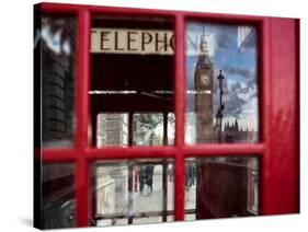 The houses of parliament reflected in an iconic red phone box in Westminster, London.-Alex Saberi-Stretched Canvas