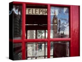 The houses of parliament reflected in an iconic red phone box in Westminster, London.-Alex Saberi-Stretched Canvas