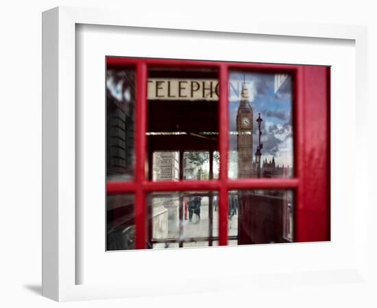 The houses of parliament reflected in an iconic red phone box in Westminster, London.-Alex Saberi-Framed Premium Photographic Print