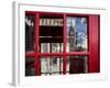 The houses of parliament reflected in an iconic red phone box in Westminster, London.-Alex Saberi-Framed Photographic Print