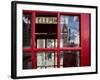 The houses of parliament reflected in an iconic red phone box in Westminster, London.-Alex Saberi-Framed Photographic Print