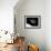 The Hubble Space Telescope in Orbit Above Earth-null-Framed Photographic Print displayed on a wall