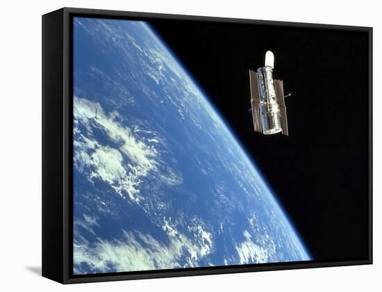 The Hubble Space Telescope with a Blue Earth in the Background-Stocktrek Images-Framed Stretched Canvas