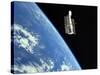 The Hubble Space Telescope with a Blue Earth in the Background-Stocktrek Images-Stretched Canvas