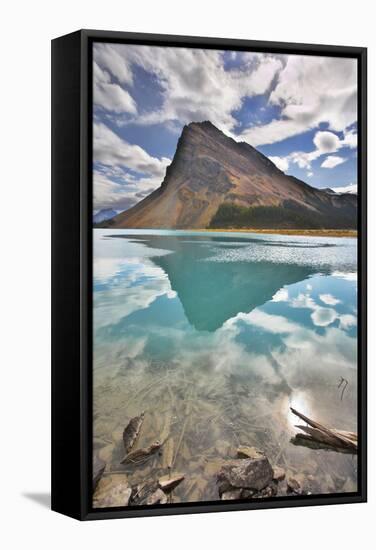 The Huge Rock Of The Triangular Form Is Reflected In Emerald Waters Of Cold Mountain Lake-kavram-Framed Stretched Canvas