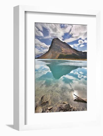 The Huge Rock Of The Triangular Form Is Reflected In Emerald Waters Of Cold Mountain Lake-kavram-Framed Photographic Print