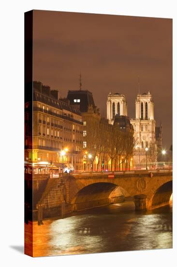 The Ile De La Cite and Notre Dame Cathedral at Night, Paris, France, Europe-Julian Elliott-Stretched Canvas