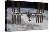 The International Space Station Backdropped Against Clouds over Earth-null-Stretched Canvas