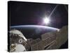 The International Space Station Backdropped by the Bright Sun Over Earth's Horizon-Stocktrek Images-Stretched Canvas