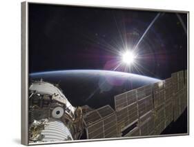 The International Space Station Backdropped by the Bright Sun Over Earth's Horizon-Stocktrek Images-Framed Photographic Print