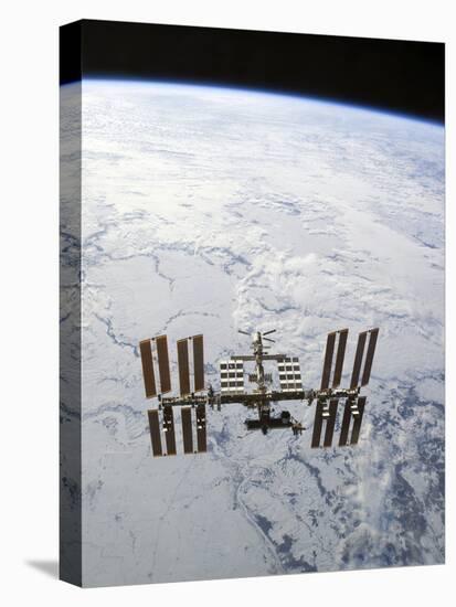 The International Space Station in Orbit Above Earth-Stocktrek Images-Stretched Canvas