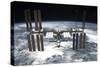 The International Space Station in Orbit Above Earth-null-Stretched Canvas