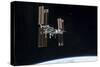 The International Space Station in Orbit Above Earth-null-Stretched Canvas