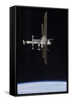 The International Space Station in Orbit Above Earth-null-Framed Stretched Canvas