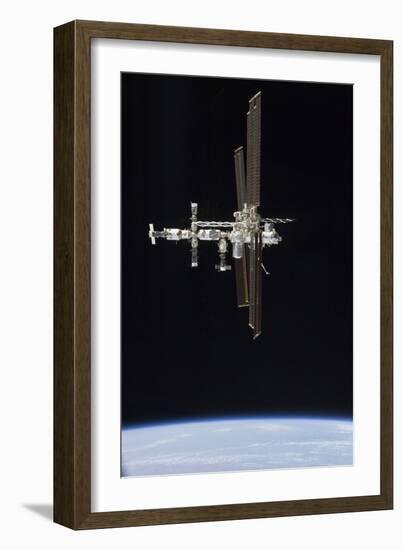 The International Space Station in Orbit Above Earth-null-Framed Photographic Print