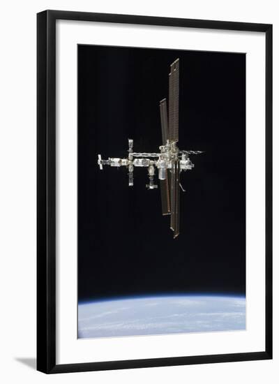 The International Space Station in Orbit Above Earth-null-Framed Photographic Print