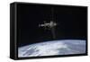 The International Space Station in Orbit Above Earth-null-Framed Stretched Canvas