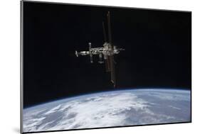 The International Space Station in Orbit Above Earth-null-Mounted Photographic Print