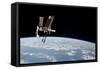 The International Space Station in Orbit Above Earth-null-Framed Stretched Canvas