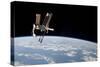 The International Space Station in Orbit Above Earth-null-Stretched Canvas